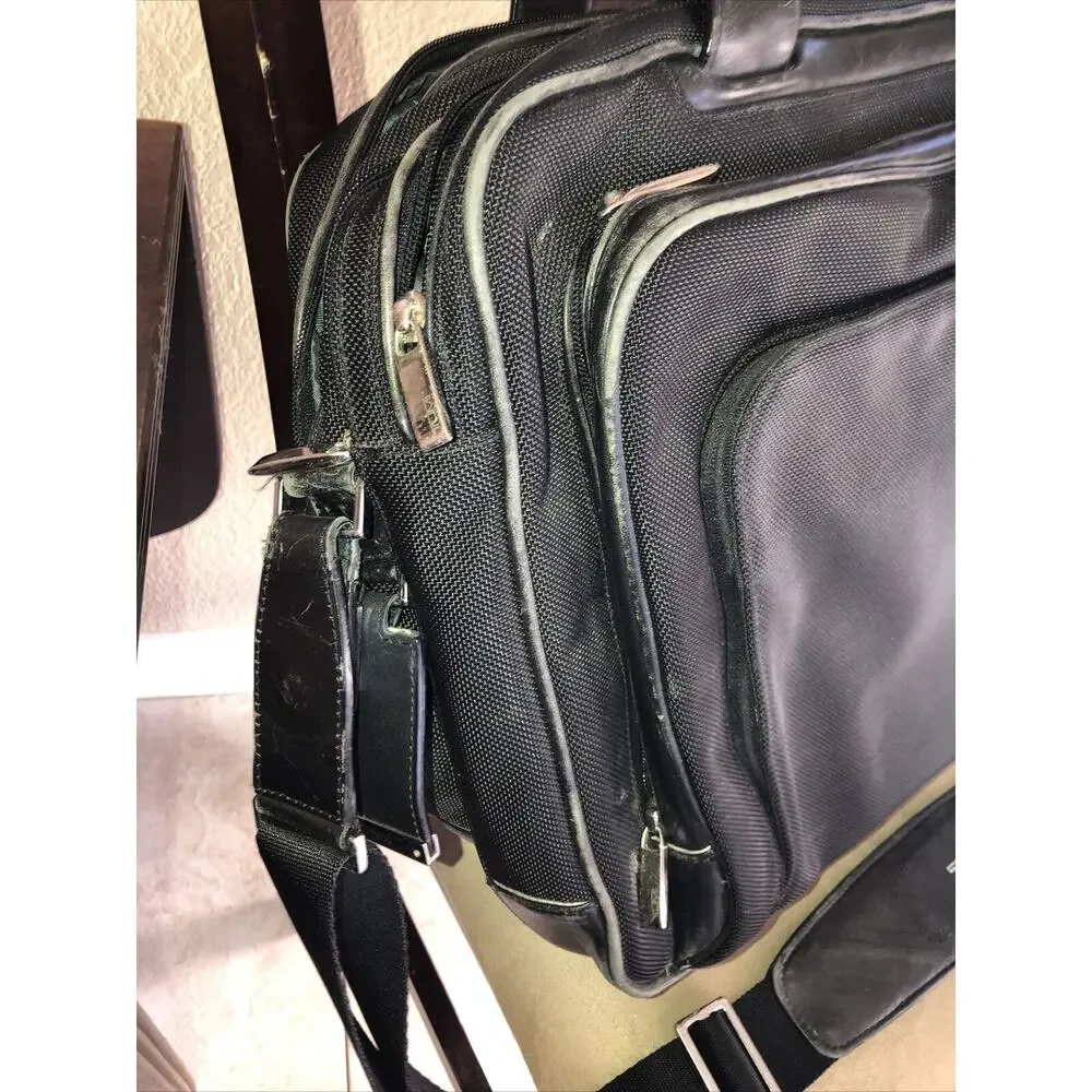 Tumi expandable leather